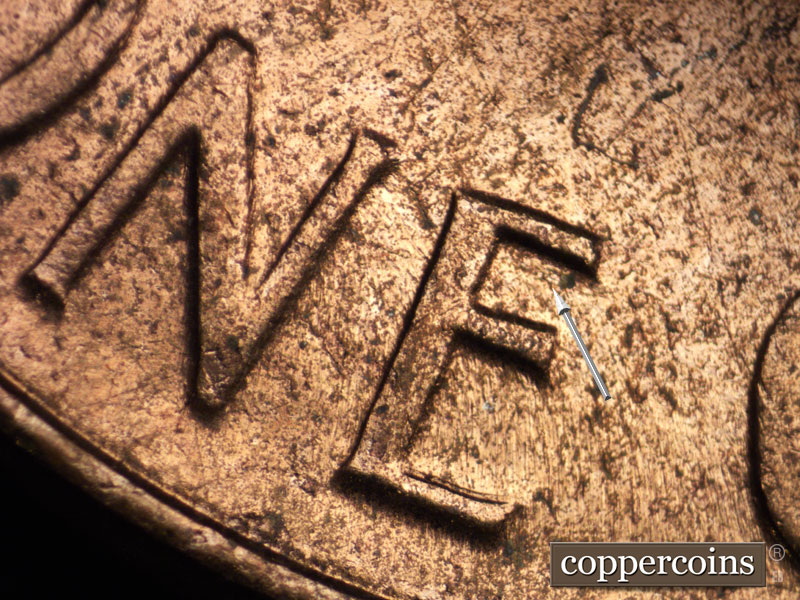 Die-stage C marker on 1963D•1DO•005 (1963 Doubled Die Obverse).