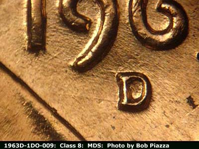 Die-stage B marker on 1963D•1DO•009 (1963 Doubled Die Obverse).