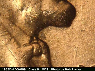 Die-stage B marker on 1963D•1DO•009 (1963 Doubled Die Obverse).