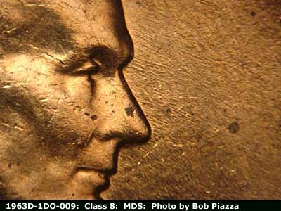 Die-stage B marker on 1963D•1DO•009 (1963 Doubled Die Obverse).