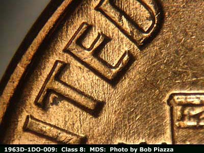 Die-stage B marker on 1963D•1DO•009 (1963 Doubled Die Obverse).