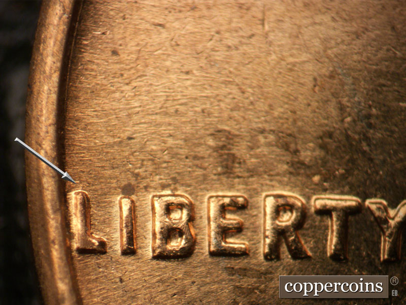 Die-stage B marker on 1963D•1DO•010 (1963 Doubled Die Obverse).