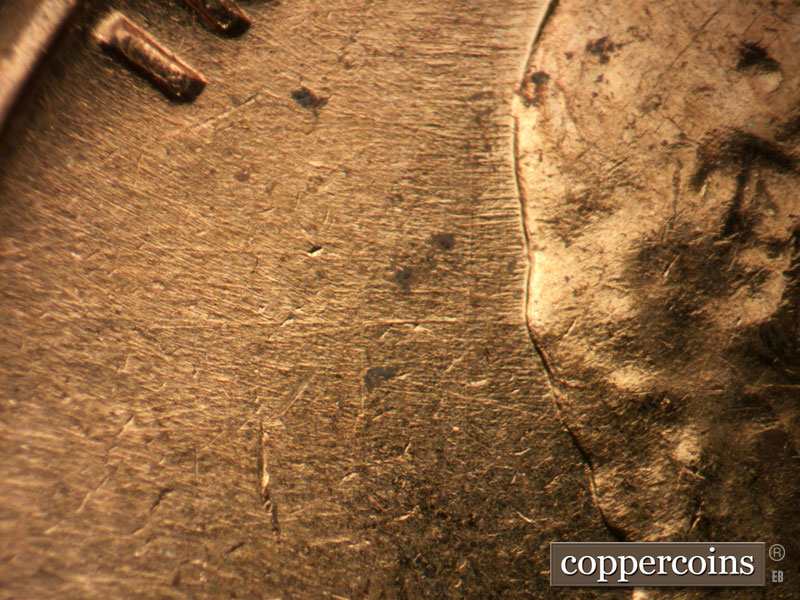 Die-stage B marker on 1963D•1DO•010 (1963 Doubled Die Obverse).