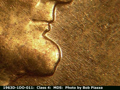 Die-stage B marker on 1963D•1DO•011 (1963 Doubled Die Obverse).