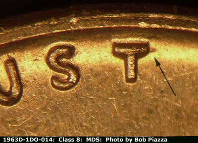 Die-stage B marker on 1963D•1DO•014 (1963 Doubled Die Obverse).