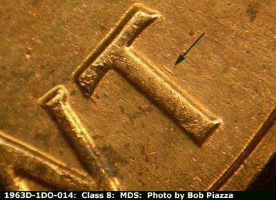 Die-stage B marker on 1963D•1DO•014 (1963 Doubled Die Obverse).
