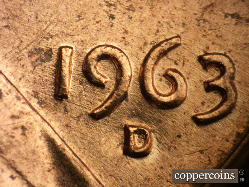 Die-stage B marker on 1963D•1DO•017 showing Horizontal die scratches through the 1, 9, and to the 6 seen in the date.