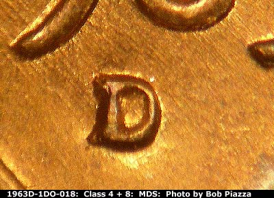 Die-stage B marker on 1963D•1DO•018 (1963 Doubled Die Obverse).