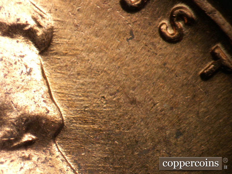 Die-stage B marker on 1963D•1DO•019 (1963 Doubled Die Obverse).