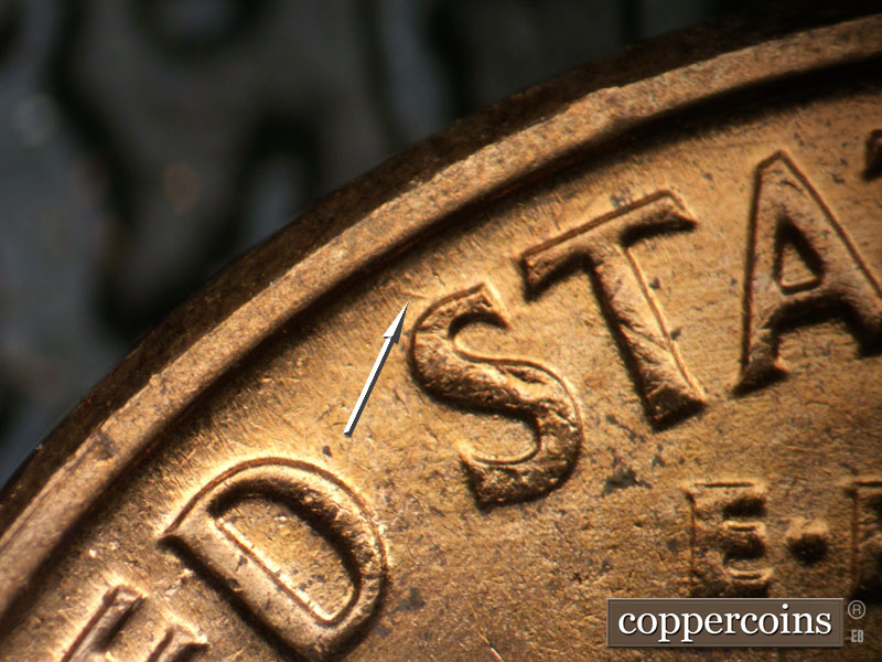 Die-stage B marker on 1963D•1DO•019 (1963 Doubled Die Obverse).