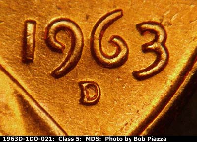 Die-stage B marker on 1963D•1DO•021 (1963 Doubled Die Obverse).