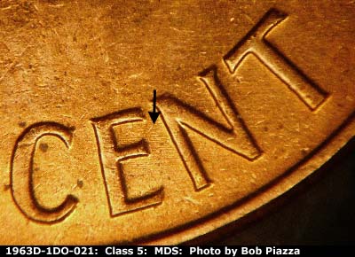 Die-stage B marker on 1963D•1DO•021 (1963 Doubled Die Obverse).