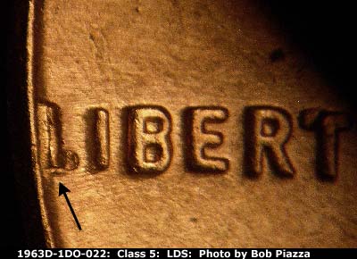 Die-stage C marker on 1963D•1DO•022 (1963 Doubled Die Obverse).