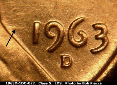 Die-stage C marker on 1963D•1DO•022 (1963 Doubled Die Obverse).