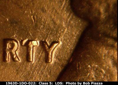 Die-stage C marker on 1963D•1DO•022 (1963 Doubled Die Obverse).