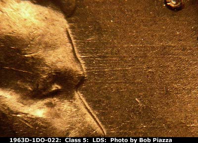 Die-stage C marker on 1963D•1DO•022 (1963 Doubled Die Obverse).