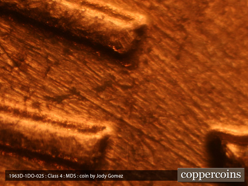 Die-stage B marker on 1963D•1DO•025 (1963 Doubled Die Obverse).