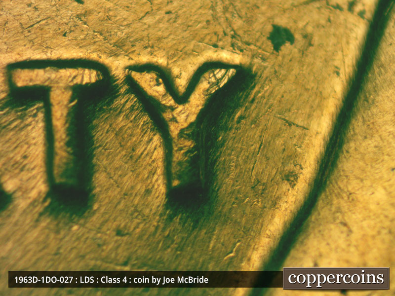 Die-stage C marker on 1963D•1DO•027 (1963 Doubled Die Obverse).