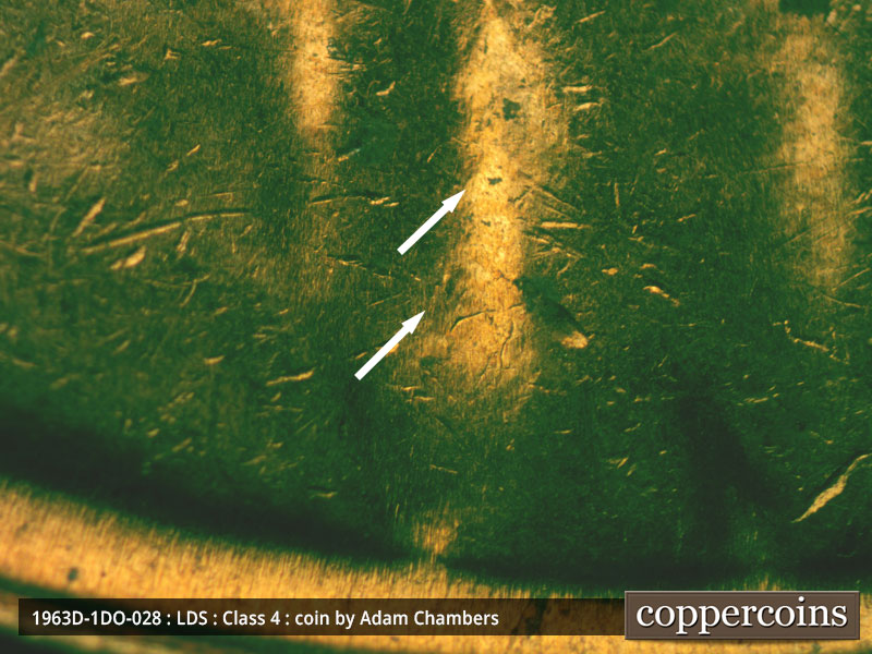Die-stage B marker on 1963D•1DO•028 (1963 Doubled Die Obverse).