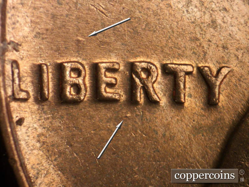 Die-stage C marker on 1963D•1DO•028 (1963 Doubled Die Obverse).