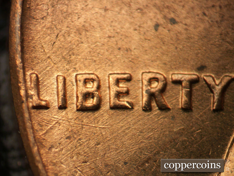 Die-stage B marker on 1963D•1DO•030 (1963 Doubled Die Obverse).