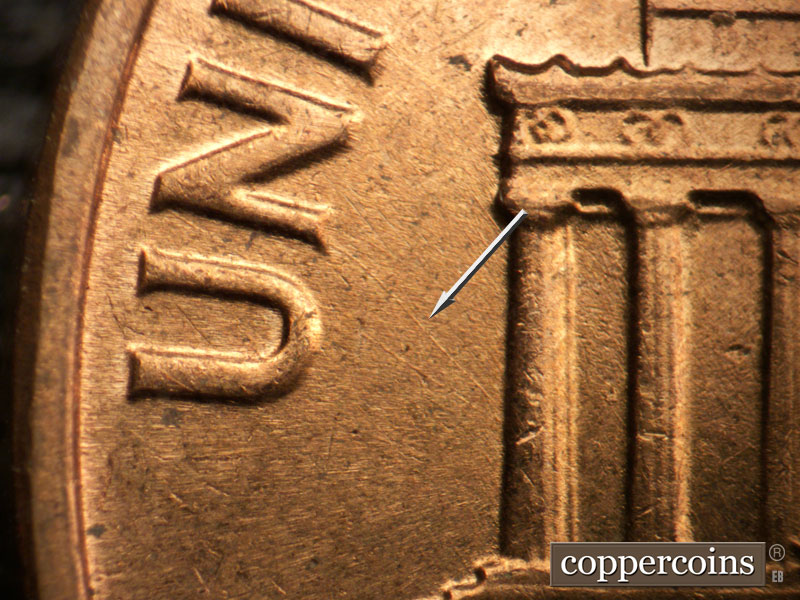 Die-stage B marker on 1963D•1DO•030 (1963 Doubled Die Obverse).