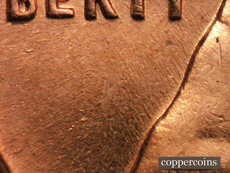 Die-stage B marker on 1963D•1DO•031 (1963 Doubled Die Obverse).