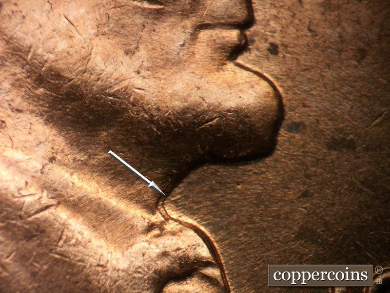 Die-stage B marker on 1963D•1DO•037 (1963 Doubled Die Obverse).