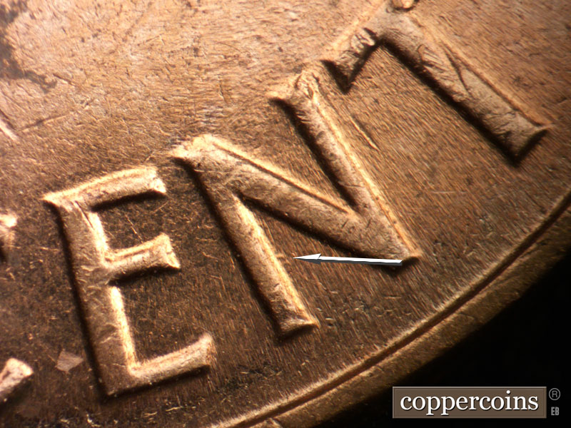 Die-stage B marker on 1963D•1DO•037 (1963 Doubled Die Obverse).