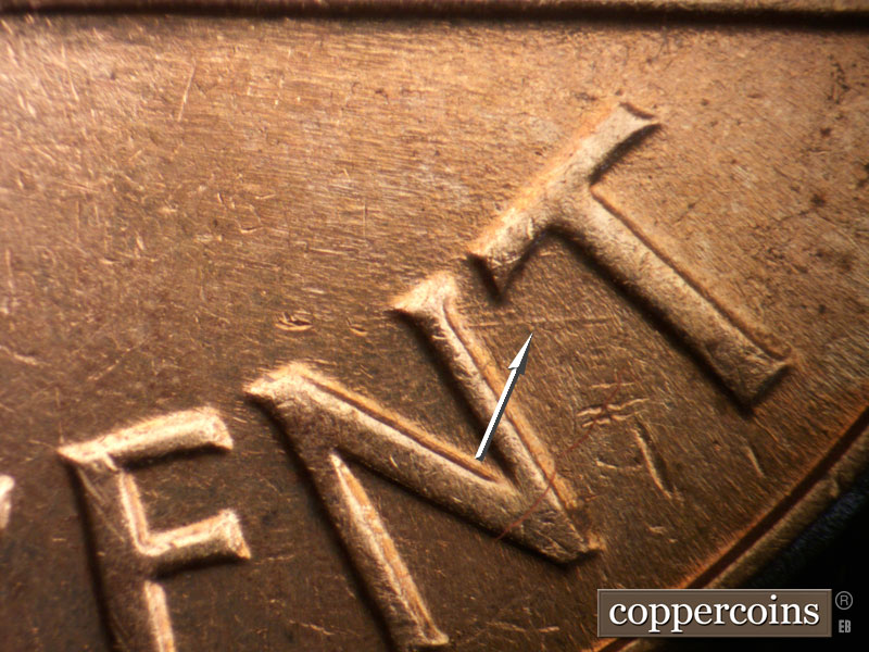 Die-stage B marker on 1963D•1DO•038 (1963 Doubled Die Obverse).