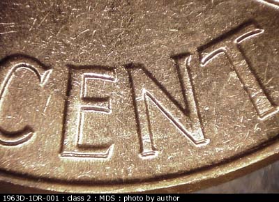 Die-stage B marker on 1963D•1DR•001 (1963 Doubled Die Reverse).