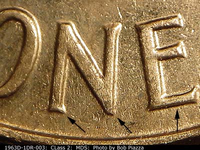 Die-stage B marker on 1963D•1DR•003 (1963 Doubled Die Reverse).