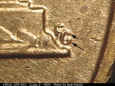 Die-stage B marker on 1963D•1DR•003 (1963 Doubled Die Reverse).