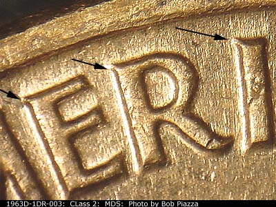 Die-stage B marker on 1963D•1DR•003 (1963 Doubled Die Reverse).