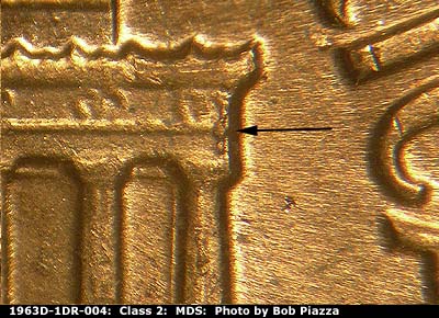 Die-stage B marker on 1963D•1DR•004 (1963 Doubled Die Reverse).