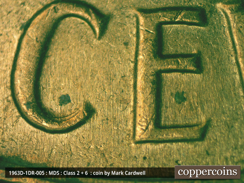 Die-stage B marker on 1963D•1DR•005 (1963 Doubled Die Reverse).