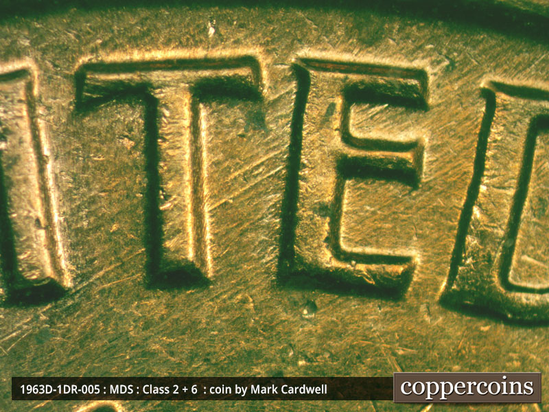 Die-stage B marker on 1963D•1DR•005 (1963 Doubled Die Reverse).