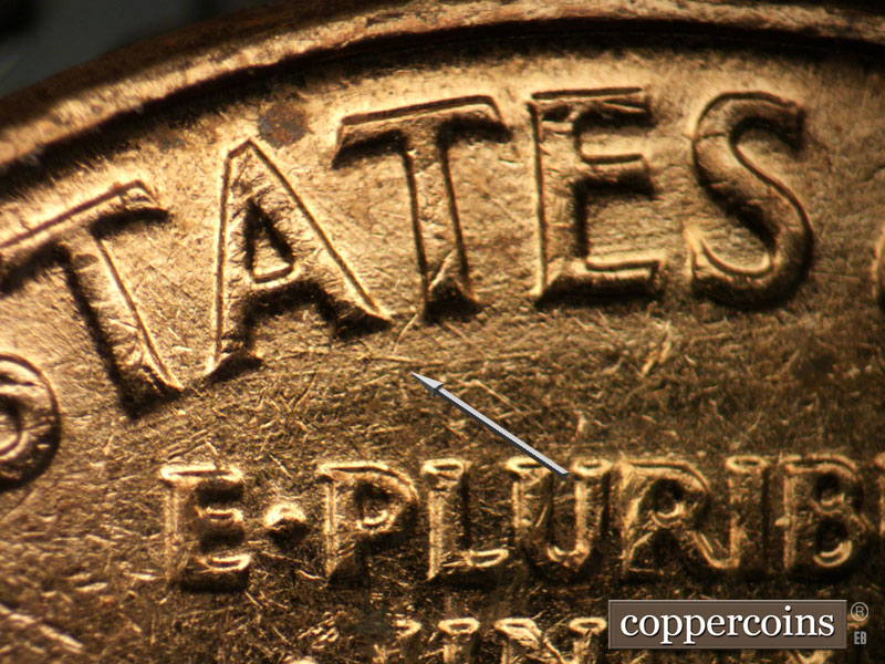Die-stage C marker on 1963D•1DR•006 (1963 Doubled Die Reverse).