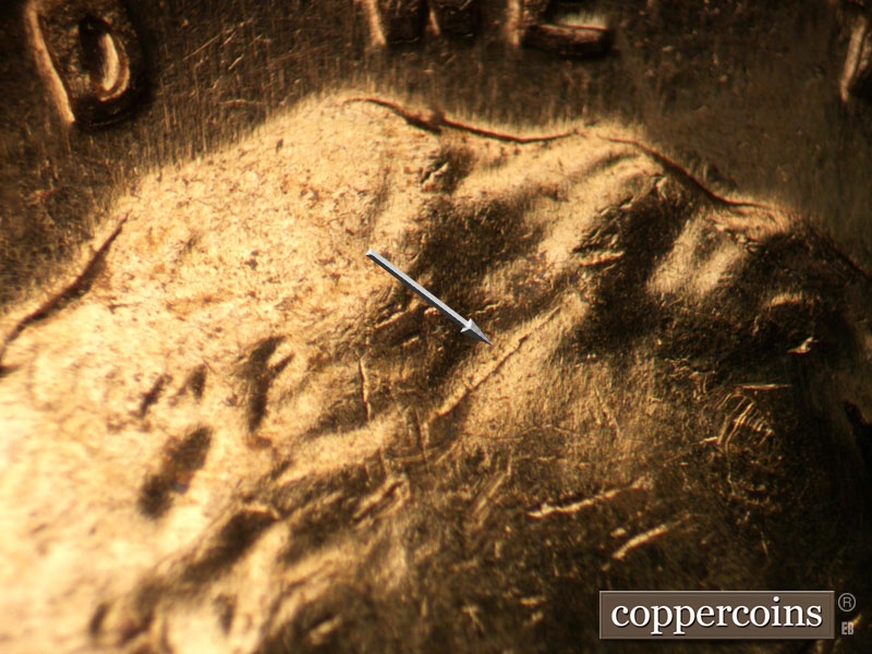 Die-stage C marker on 1963D•1DR•006 (1963 Doubled Die Reverse).