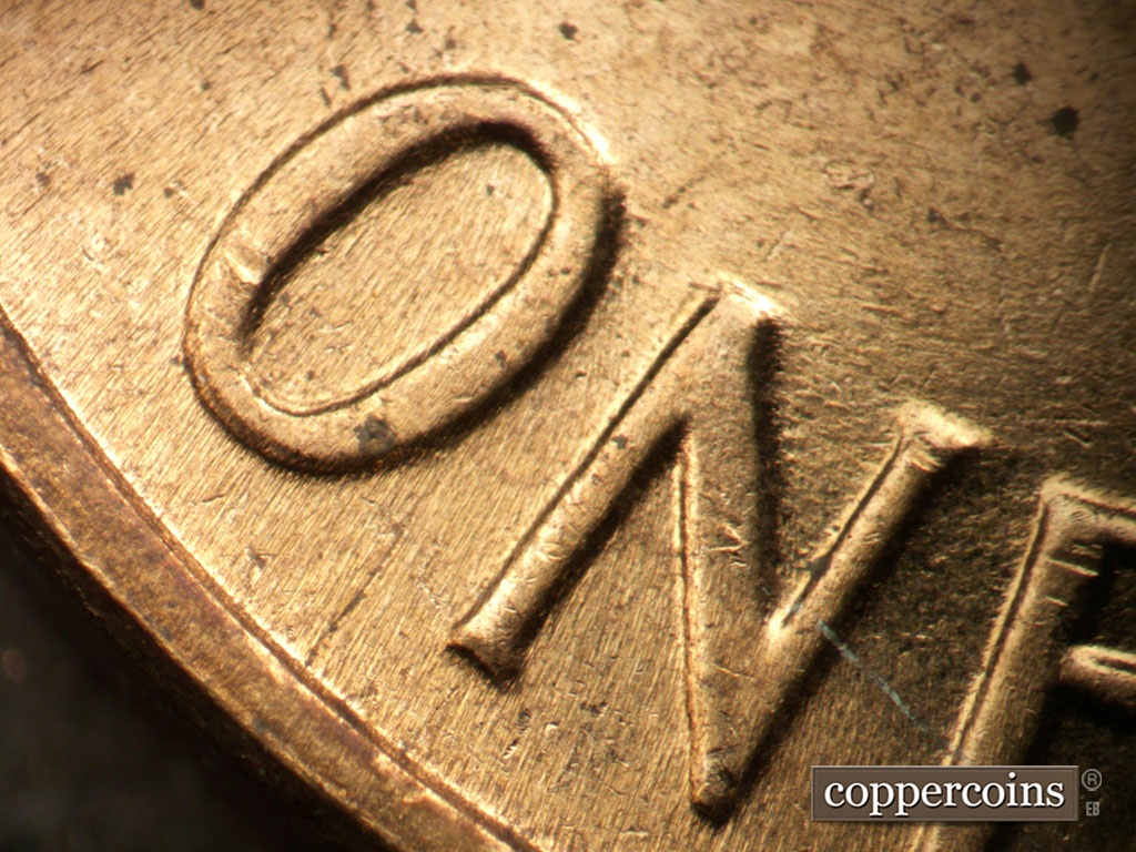 Die-stage C marker on 1963D•1DR•007 showing Doubling seen on bottom of ONE.