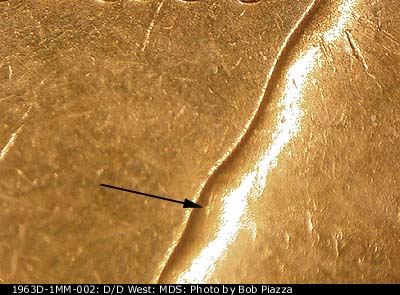 Die-stage B marker on 1963D•1MM•002 (1963 Repunched Mint Mark).