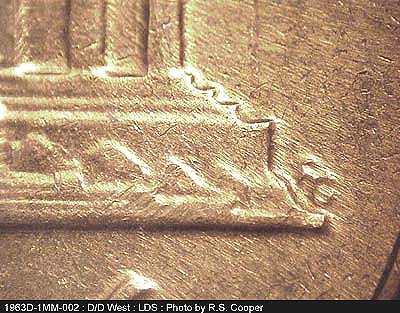 Die-stage C marker on 1963D•1MM•002 (1963 Repunched Mint Mark).