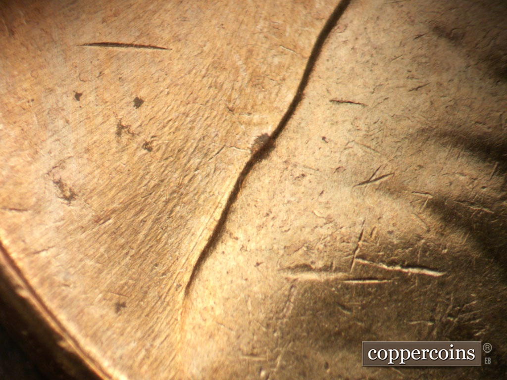 Die-stage C marker on 1963D•1MM•003 (1963 Repunched Mint Mark).