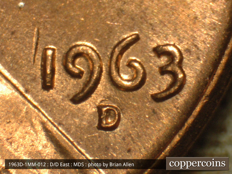 Die-stage B marker on 1963D•1MM•012 (1963 Repunched Mint Mark).