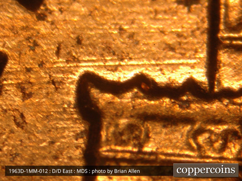 Die-stage B marker on 1963D•1MM•012 (1963 Repunched Mint Mark).