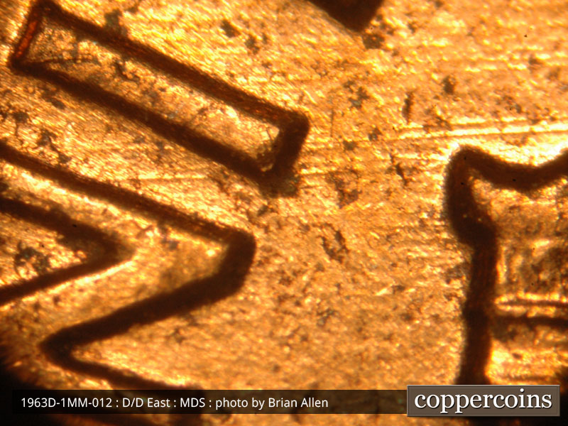 Die-stage B marker on 1963D•1MM•012 (1963 Repunched Mint Mark).