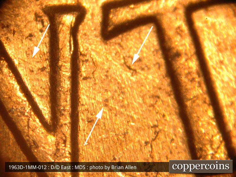 Die-stage B marker on 1963D•1MM•012 (1963 Repunched Mint Mark).