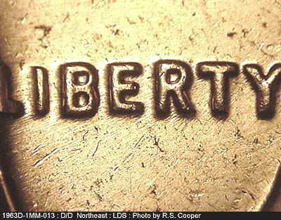 Die-stage C marker on 1963D•1MM•013 (1963 Repunched Mint Mark).