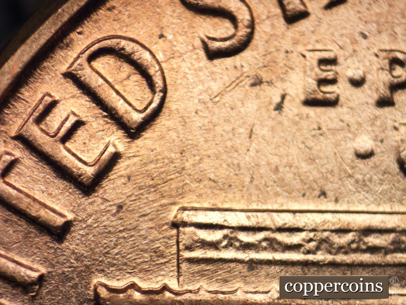 Die-stage B marker on 1963D•1MM•014 (1963 Repunched Mint Mark).