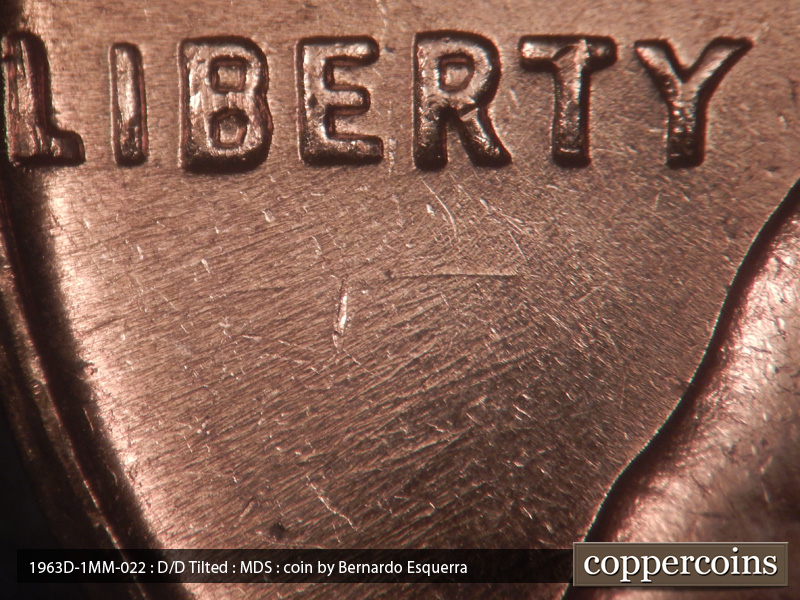 Die-stage B marker on 1963D•1MM•022 (1963 Repunched Mint Mark).